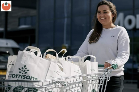 Morrisons shopper with branded bags